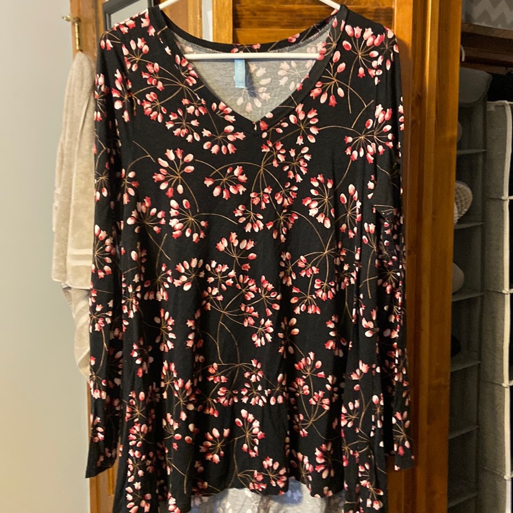 Black long sleeve top with pick floral design.
